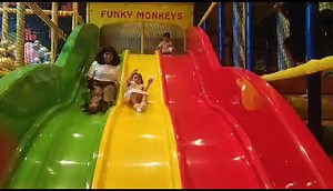 Our signature multi-lane wave slides at Funky Monkeys are always a...