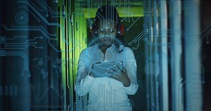 Animation of data processing over african american female it engineer and computer servers. Global computing and data processing concept digitally generated video