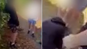Shocking moment bully forces boy to kiss his shoes
