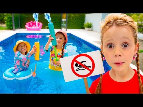 El papá de Nastya les enseña a los niños las reglas de seguridad en la piscina.