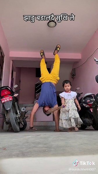 Handstand Tricks and Child's Play in a Bright Garage