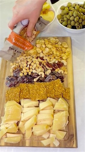 Charcuterie board: cheese, dates, nuts, fruit #charcuterieboard #cheeseboard #snacks #cooking #asmr