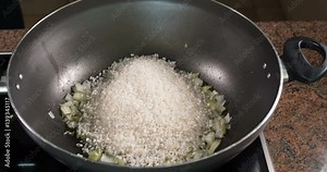 Time lapse: cooking a delicious Spanish seafood paella: mussels, king prawns, langoustine, haddock Stock Video