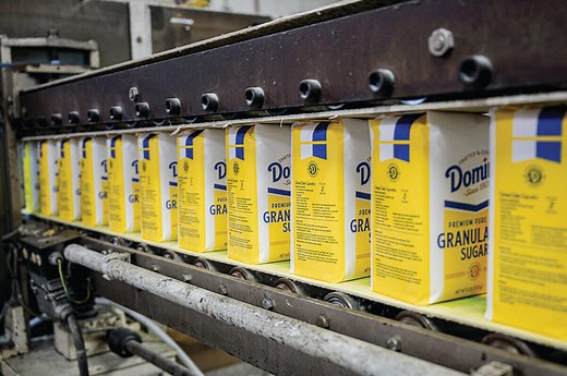 Baltimore’s Domino Sugar Refinery Celebrates 100 Years on the Harbor