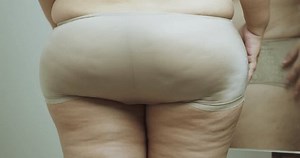 clip-3623034257-asian-oversize-woman-care-about-cellulite-on