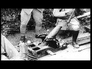 French soldiers demonstrate a 58mm trench mortar during World War I HD Stock Footage