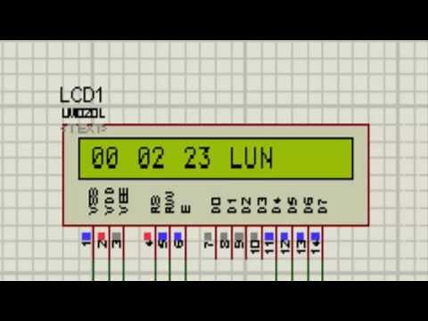 réalisation d'une horloge numerique avec LCD et PIC16F877A proteus ISIS et Mikro for PIC