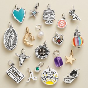 Start a charm bracelet and give your memories a home. We have more than 600 charms to help tell your story. Shop your favorite designs (and more) at https://bit.ly/3jANMjW | James Avery Artisan Jewelry