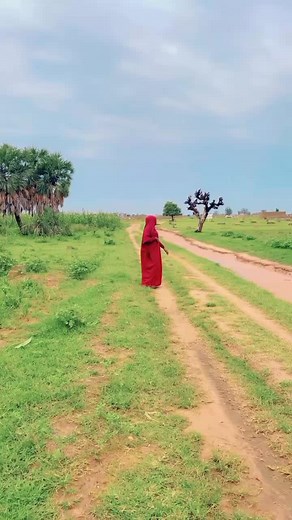 Walking Through Rural Landscapes in Traditional Attire