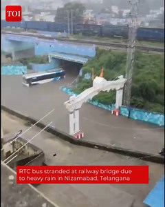13K views · 98 reactions | Watch | RTC bus stranded at railway bridge due to heavy rain in Nizamabad, #Telangana | The Times of India | Facebook