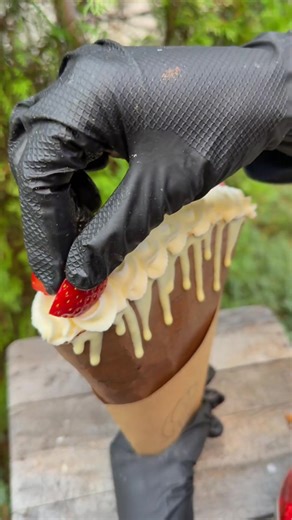 This is how you turn a simple crepe into the ultimate dessert experience. I'm obsessed with that chocolate drizzle and the mountain of fresh strawberries on top. Tag someone who needs to make you one of these immediately! | Chefclub Network