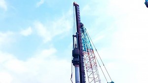 spun pile foundation process, diesel hammer drops the load onto the pile material driving into the ground at the construction site. Jakarta 2 May 2022