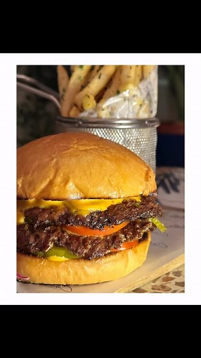 Perfectly cooked beef, melty cheese, and a touch of flair this isn’t fast food, it’s flavor couture. 💙 | Colette