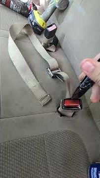 how to fix a stuck seatbelt buckle