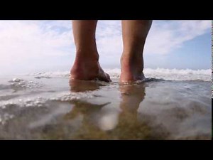 beach feet wave crash