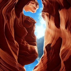 7.7K views · 290 reactions | Take a walk through the sweeping red rocks in Antelope Canyon and look up at the incredible view . Don't forget to pack your camera and book a local tour guide! | Visit The USA | Facebook