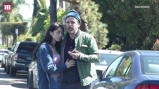 Casey Affleck and rumored fiancé Caylee Cowan talk on the phone while out in LA
