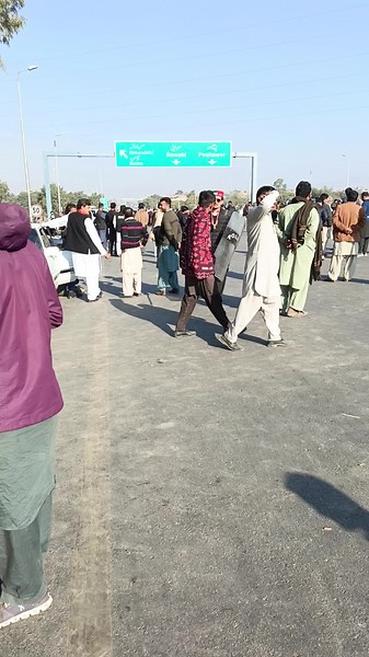 Police Presence at Checkpoint: Community Gathering