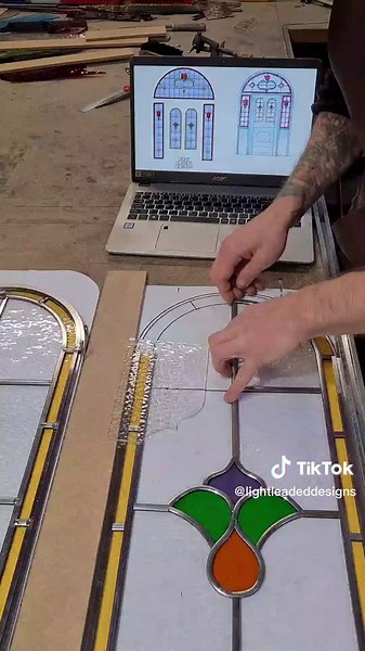 2/3's the way through this entrance window set project today. Tomorrow I'll be making a start on the big arched window that's going to be fitted above. If you look closely you can see the design drawing on my laptop. The design was actually handdrawn by my client and I made a couple of little suggestions and tweaks and the project is coming together nicely 🤗 #stainedglass #handmadewithlove #makersoftiktok #asmrvideo #asmrmaking #glassartwork #making #howitsmade # #progressvideo #homeproject #cu