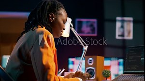 African american system engineer using AI system to write computer program code, html terminal window. Woman works with deep learning algorithms, artificial intelligence neural networks. Camera A.
