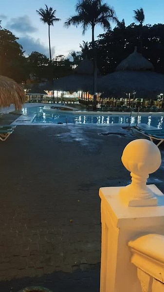 Serene Twilight Pool Area with Spherical Baluster