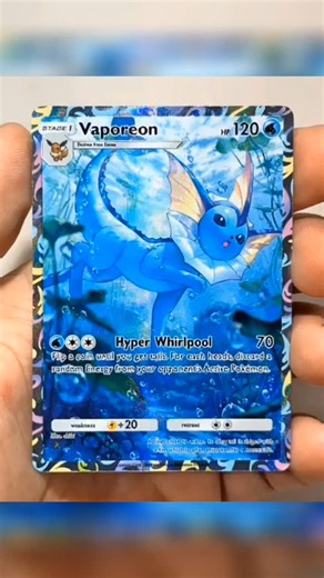 PokeCardz on Instagram: "✨ Vaporeon Holo Pull! One of the cleanest Eeveelutions in the TCG — the shimmer, the art, the vibes… everything hits perfectly. If you’re an Eevee-lover, this is a must-have in your binder. 💧💙 Would you grade it or keep it raw? Hashtags: #Vaporeon #PokemonCards #Eeveelutions PokemonTCG"