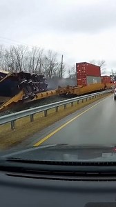Train Derails Next to Busy Highway Ravenna, Ohio — March 14, 2025 A routine morning commute turned into a scene of destruction when several cars of a freight train derailed just feet away from a busy highway. The incident, which was captured on a motorist's dashboard camera, shows the train traveling at a moderate speed before the container cars begin to violently shift and lose contact with the tracks. The footage reveals the terrifying moment several large shipping containers topple over, crea
