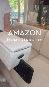 https://urlgeni.us/amzn/coucharmrest ❤️This beautiful SMART removable arm rest fits securely between the cushions of your couch, features an extra large cup holder and hidden storage for your remotes! It also has a unique charging port with a wireless phone charging stand, or you can swap out with this LED reading light. Optional additional accessories available include a mini fan, swivel tray, stereo speakers and more!#amazonhome #homehacks #amazonfinds #amazonmusthaves #amazonfavorites | The D