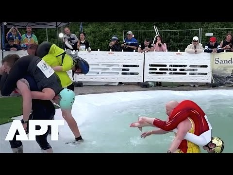 Wife Carrying World Championships 2025: U.S. Couple Wins Big in Finland’s Wildest Race Yet! | APT