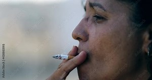 Sad depressed woman smoking cigarette. Real expression, tired person