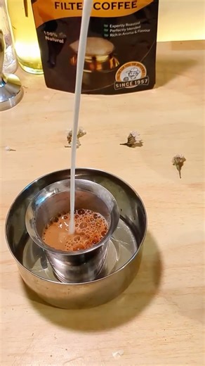 Filter Coffee The smell of filter coffee brewing is enough for anyone to yearn for a cup of good old kaapi! I love the whole process of filter coffee making, the coffee powder, to the decoction, to the vessels... Everything is so aesthetically pleasing! Are you a filter coffee lover? #filtercoffee #southindiancoffee #coffeereel #caffeine #coffeeaddict #coffeeholic #coffeelovers | Adv Ritwij Shrivastava