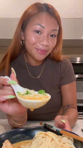 Craving a taste of singapore so we make it work with what we have #laksa #currylaksa 2 pieces chicken thighs 1 tsp garlic powder 1 tsp onion powder 1 tsp white pepper 1 tsp cornstarch 1 tsp neutral oil 2 Tbsp Thai red curry paste 1 can coconut milk 1 can chicken broth 1 tsp curry powder 1 Tbsp fish sauce Juice of half a lime Mee hoon noodles (or whatever you have), shrimp, fish balls, tofu puffs, bean sprouts & cilantro to serve Cut your chicken thighs into strips and mix in seasoning, cornstarc