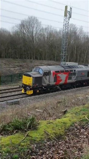 CLASS 37 510 going under buzz bomb bridge.