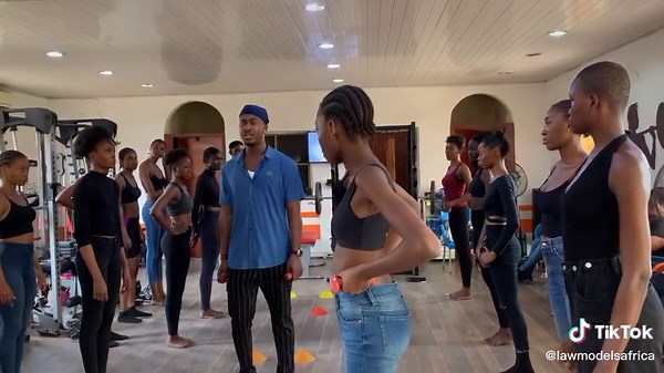 Group Dance Workout Session in Fitness Studio