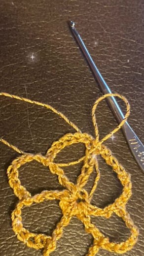 Erishkigal Skully Snowflake pattern by Warmer than a Witches Knits (awesome name brw!) making a small quick gold skull doily/snowflake. #crochetersoftiktok #yyccrochet #inkcrochet #imnotknitting #crochet #crochetskull #doily #auntlydiascrochetthread