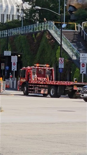 FDNY Flatbed Tow Truck Passing By On West Street In Lower Manhattan, New York City