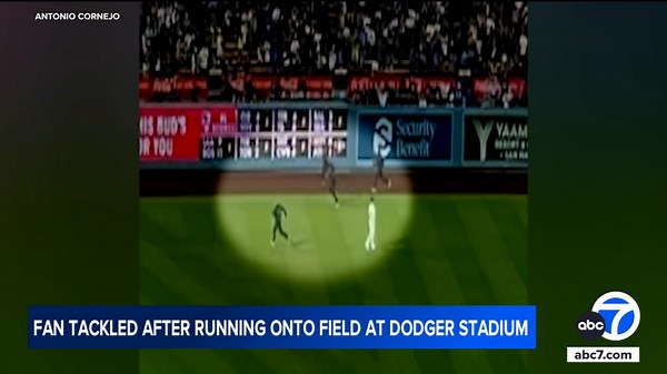 Video shows shirtless man running onto field at Dodger Stadium