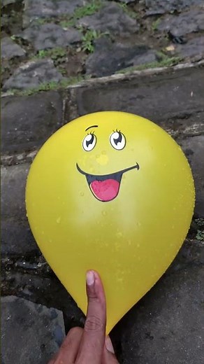 What Happens When a Water Balloon Falls Off a Cliff?