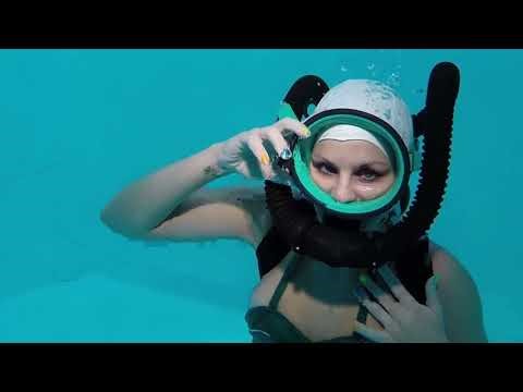 Female Diver is Diving with Swim Suit and Rubber Swim Cap