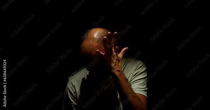 The Descent into Madness. A Desolate Figure Screaming and Unraveling in the Depths of Darkness. In the midst of darkness, a despondent man sits, driven to the brink of madness by internal struggles.