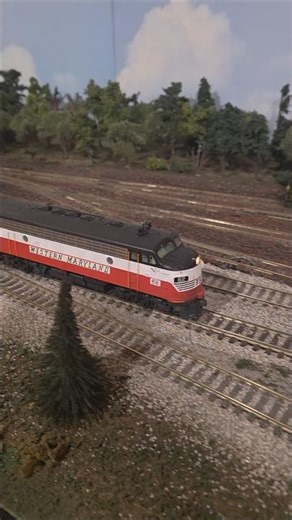 Western Maryland Grain Train passing a Mixed Freight on the Western Maryland Modular Layout.