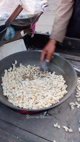The Art of Cooking Popcorn in Hot Sand