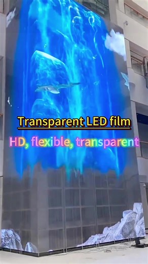 This is flexible LED transparent film screen 3mm ultra-thin design Transparency 90% No structure required Directly attach to glass for installation Turn on the power to play the video #ledtransparentfilm #leddisplay #ledtransparencescreen #ledglassscreen #ledwall #filmtransparent #ledfilm #HTURGBFILM #HTURGB