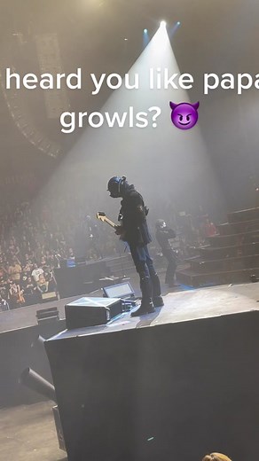 Captivating Performance by The Band Ghost with Stunning Microphone