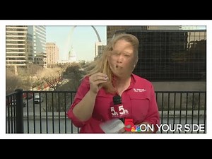 The struggle in the wind is real as reporter battles strong winds ahead of severe weather