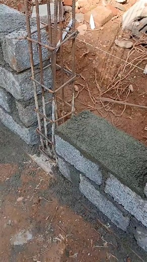 Building a strong foundation starts with the right steps. This man is hard at work constructing a wall, one rock at a time, showcasing dedication and skill in outdoor craftsmanship. It's all about precision and patience! 🛠️🏗️ #building #ground #outdoor #person #wall #step #rock | Flei Mong