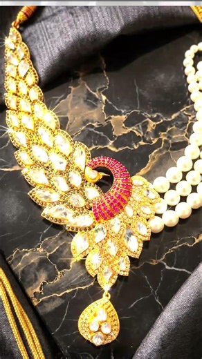 The Paparazzi Called... They want a closer look. 😉✨​​🏷️ #PeacockNecklace #StatementPiece #RedCarpet
