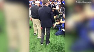 Texas' longhorn Bevo charges at Georgia's bulldog before bowl game