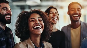 Download A group of people laughing together for free