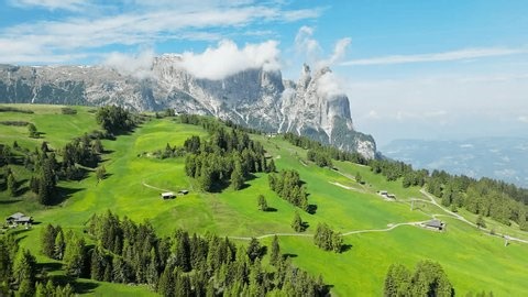 clip-4004579729-scenic-alpine-dolomites-mountain-scenery-alps-cabins